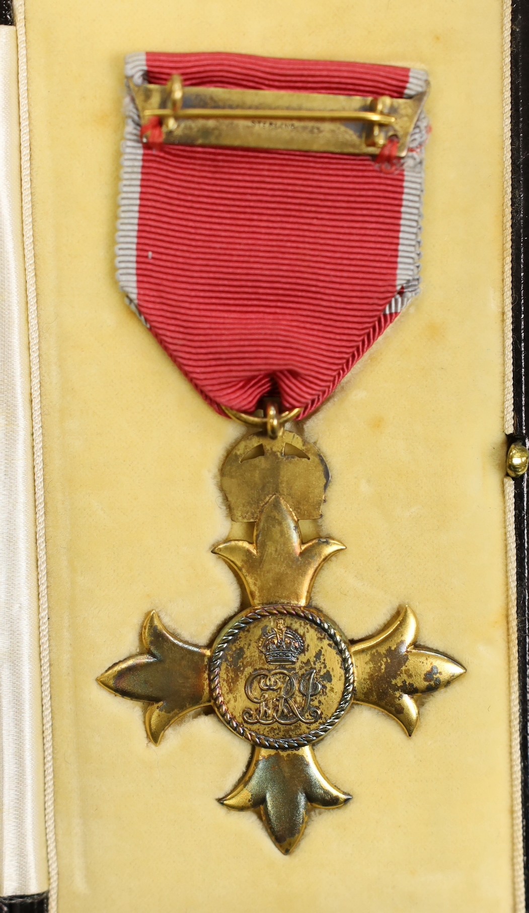 A cased O.B.E. Medal